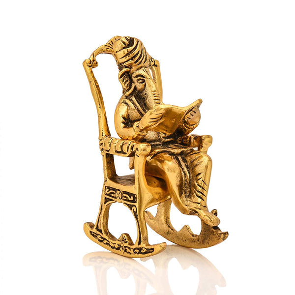 Lord Ganesha Reading Ramayana Statue Sitting on Chair